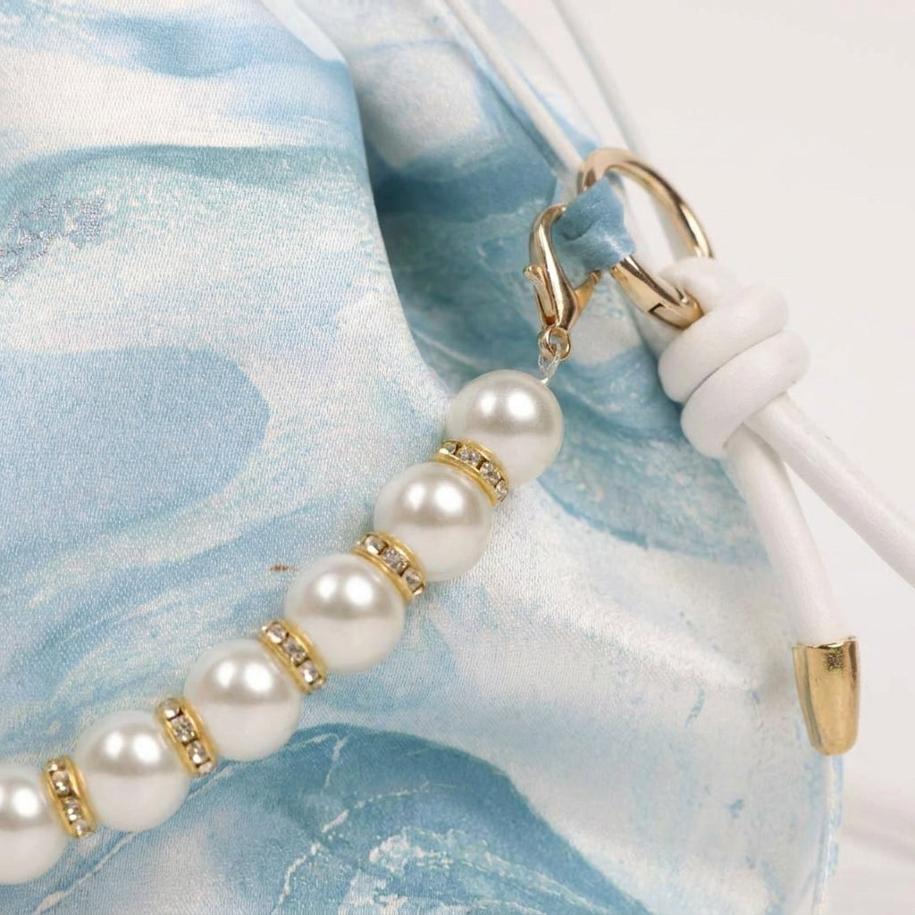 Drawstring pearl bag  Marbled in Natural Lacquer · Never the Same Twice