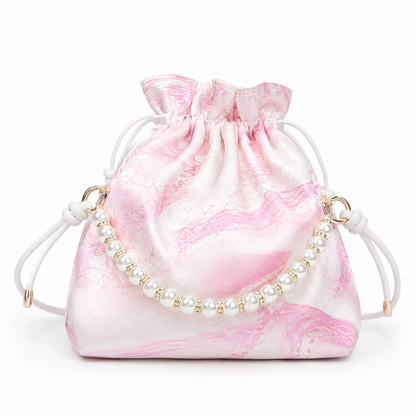Drawstring pearl bag  Marbled in Natural Lacquer · Never the Same Twice