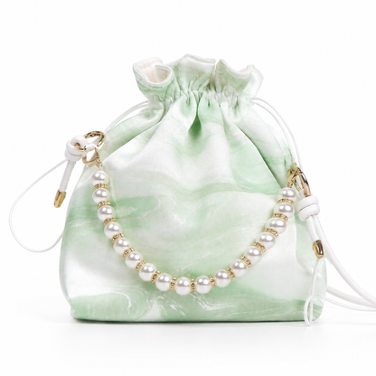 Drawstring pearl bag  Marbled in Natural Lacquer · Never the Same Twice
